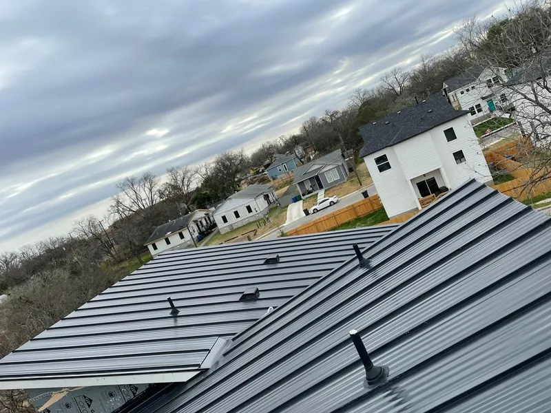 Standing seam metal roof panels with vents for Skylight Repair in Firestone